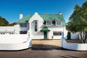 Art Deco Coastal Apartment with Private Garden